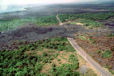 photo 059.  Photo of lava flow that has crossed and covered a road