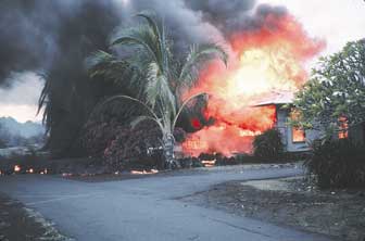 A burning building in the village of Kalapana